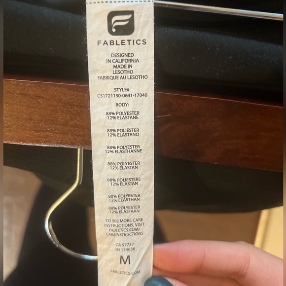 Fabletics capri leggings in black with geometric print design. - Picture 6 of 6